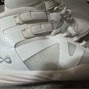 Infinity cheer shoes 
Size 6 women 
Worn 4 times to perform only